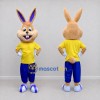 Custom Tan Yellow and Blue Rabbit in Sportswear Mascot Costume Adult Full Body Suit for Easter Events Custom Tan Yellow and Blue Rabbit in Sportswear Mascot Costume Adult Full Body Suit for Easter Events