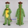 Custom Green and Orange Dinosaur Character with a Hat and Bow Tie Mascot Costume Adult Full Body Suit for Dinosaur Events Custom Green and Orange Dinosaur Character with a Hat and Bow Tie Mascot Costume Adult Full Body Suit for Dinosaur Events